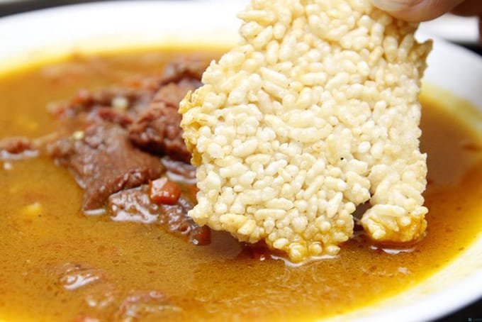 Perfect Ninh Binh Day Trip Itinerary from Hanoi: Temples, Caves & Culinary Treasures Mountain Goat Meat with Crispy Rice