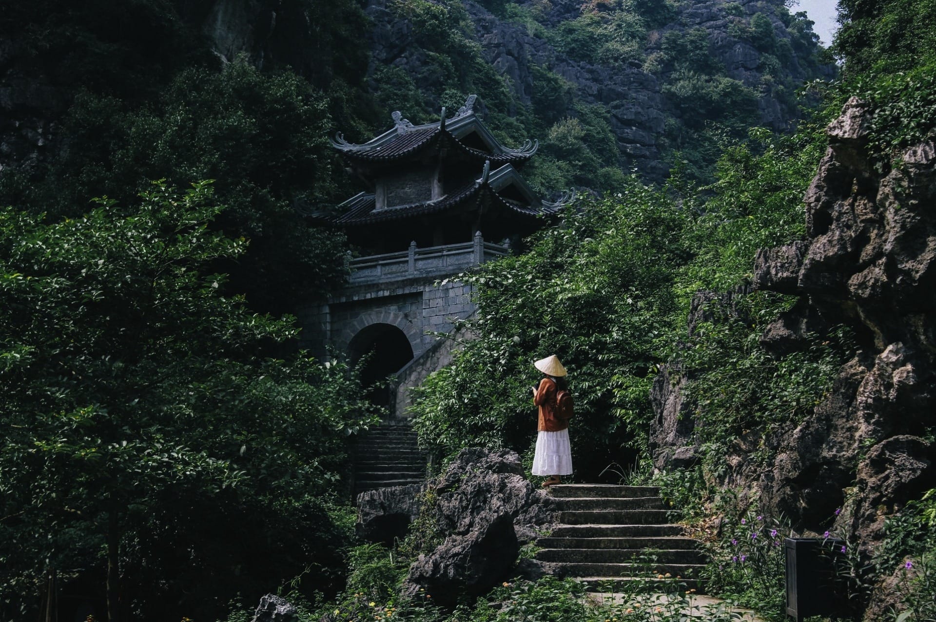 The iconic Am Tien Cave pagoda gate, often dubbed the Tuyệt Tình Cốc (Love Lock Valley) of Ninh Binh