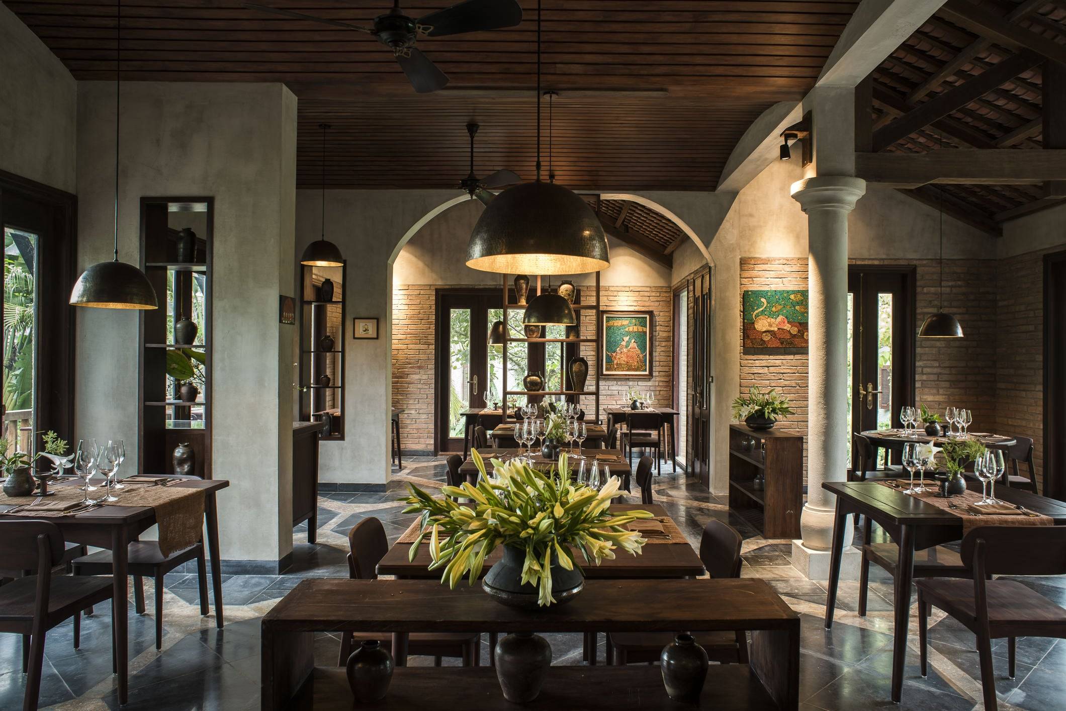 Charming wooden bungalows at Nham Village Resort, designed for comfort and rustic elegance