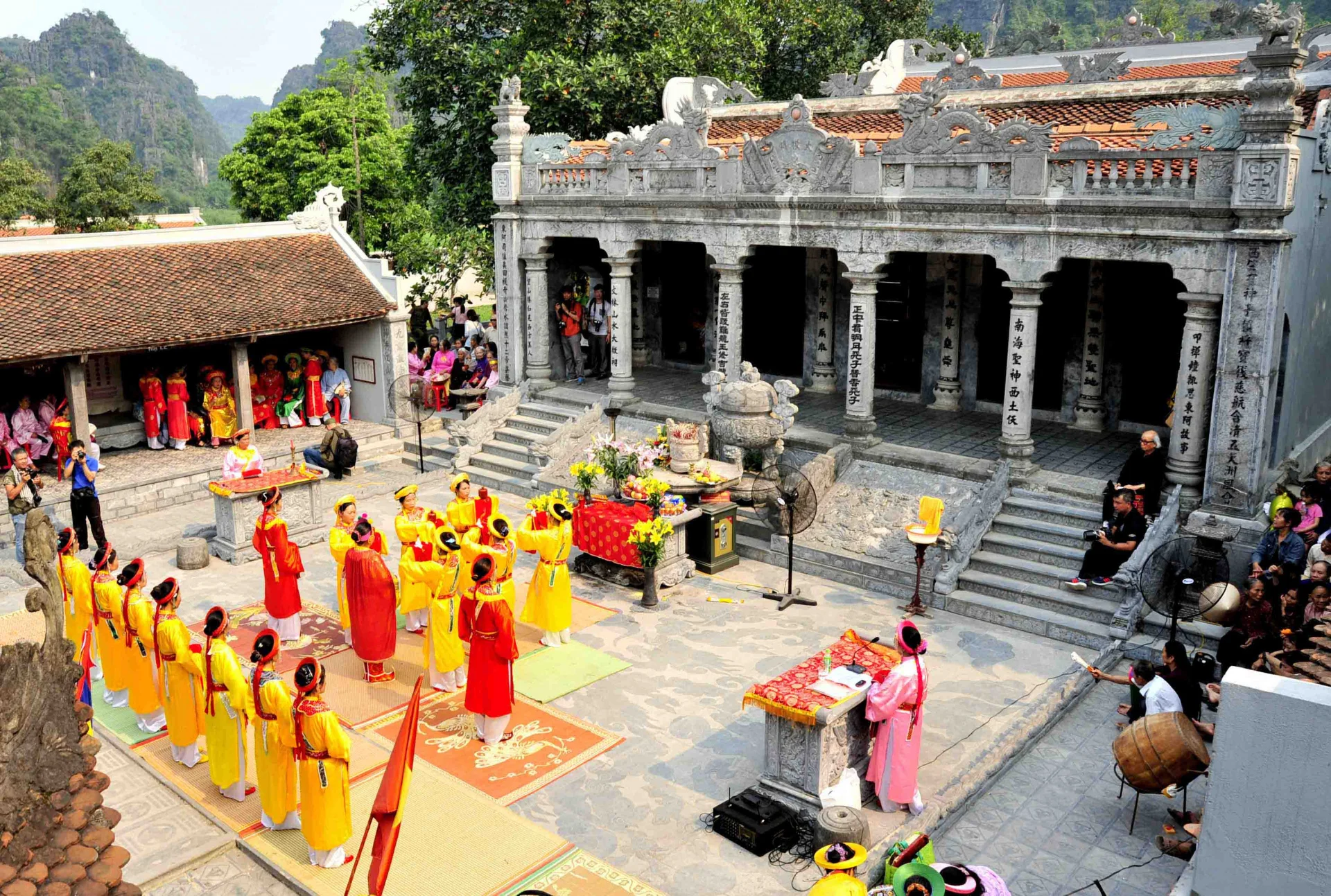 A scene of the vibrant spring festival, showcasing pilgrims and colorful decorations during the busiest time of year.