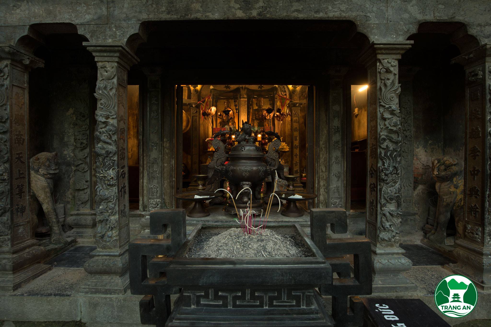 A close-up of the temple's monolithic blue stone elements, showcasing the intricate carvings of the Four Sacred Beasts