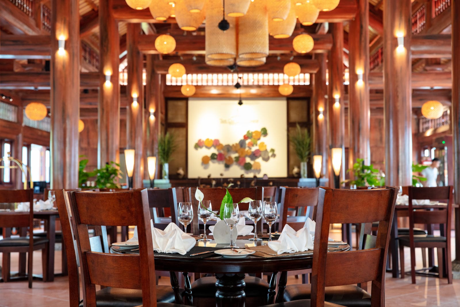 Unwinding with traditional restaurant and water views at this elegant Trang An Resort.