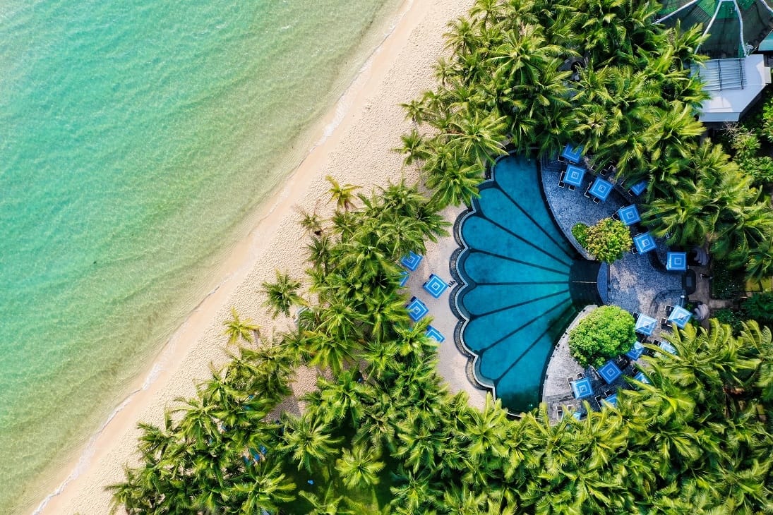 Yoga Retreat Vietnam: Top Wellness Escapes for Mind, Body & Soul Celebrating a private romantic escape vietnam with tranquil sunset meditations by the water.