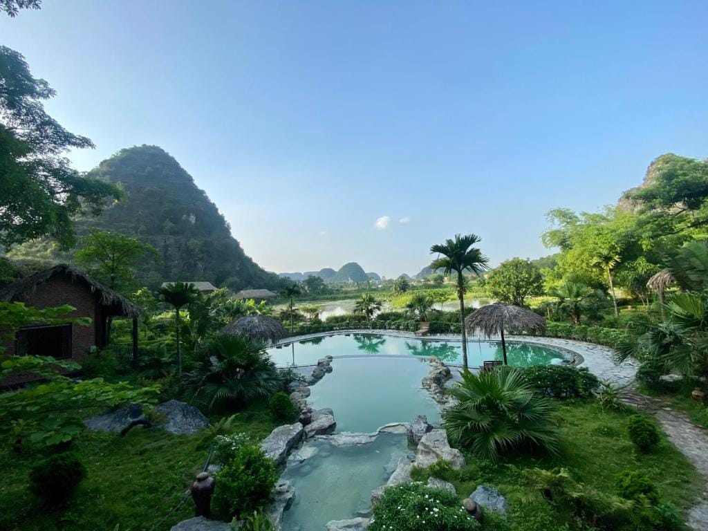 Poetic villa-style living at one of the most sophisticated Tam Coc accommodation options near the river.