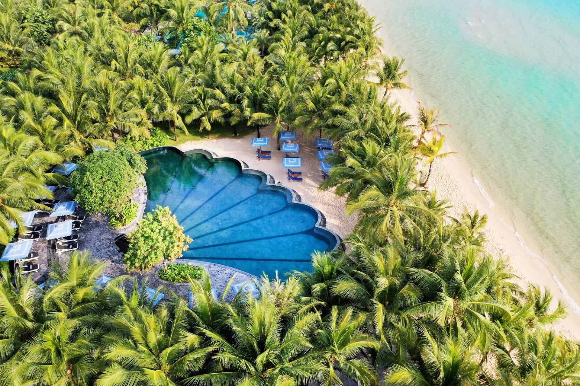  Pristine white sands and turquoise waters at Emerald Bay, the stunning home of this creative retreat.