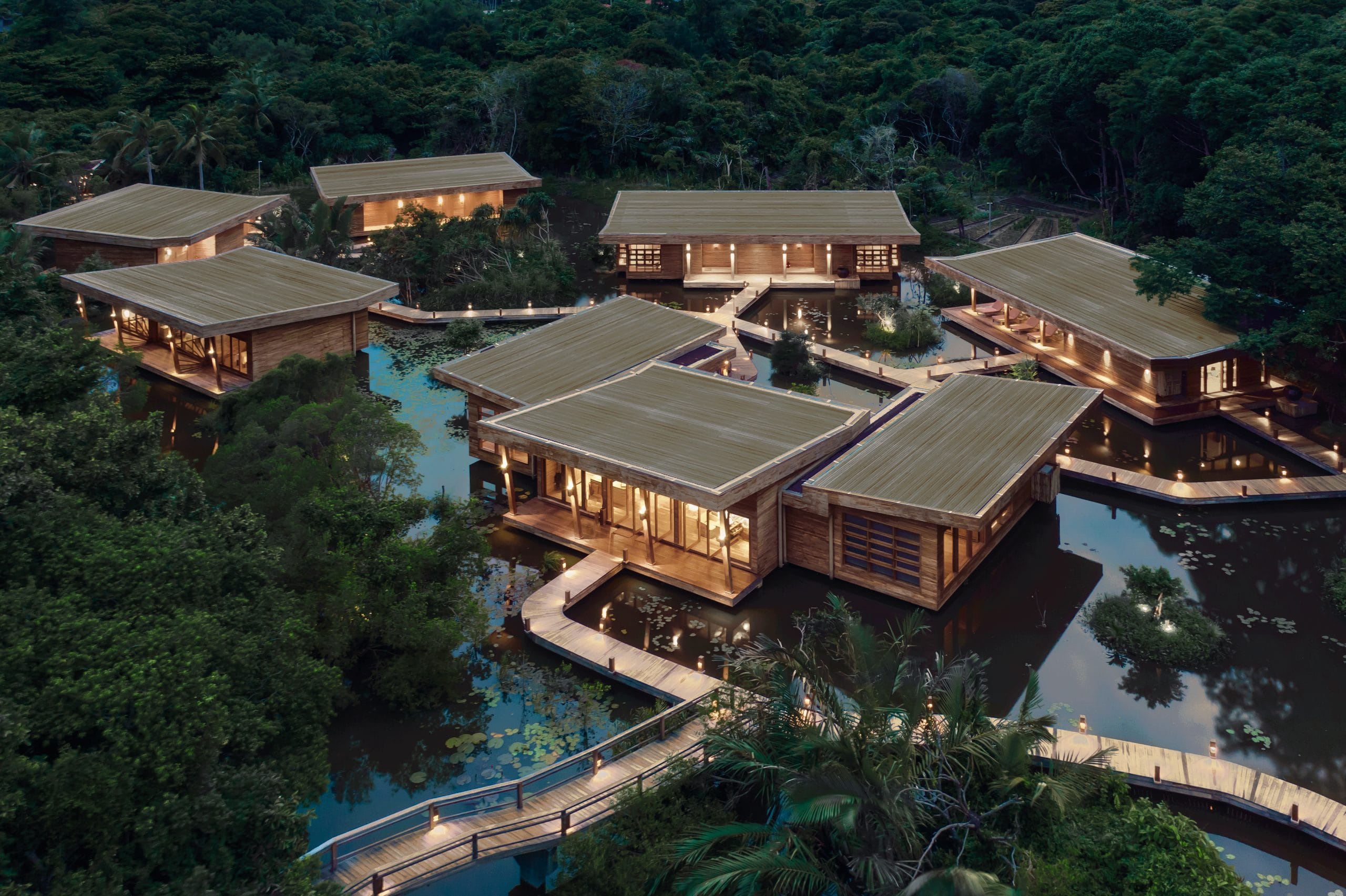A sustainable vietnam resort experience inspired by a traditional fishing village architecture.