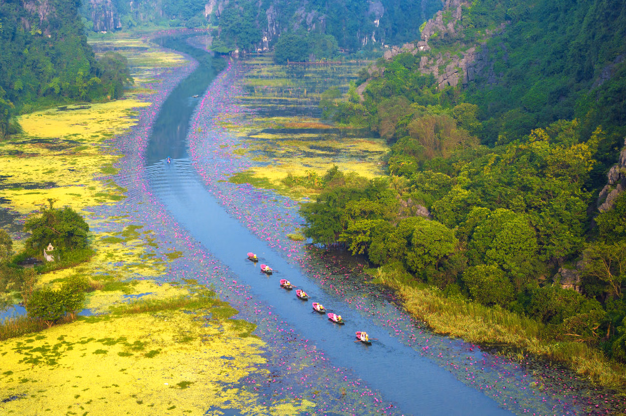 A panoramic view of the Tam Coc valley, the perfect starting point for your ninh binh 2 day itinerary.
