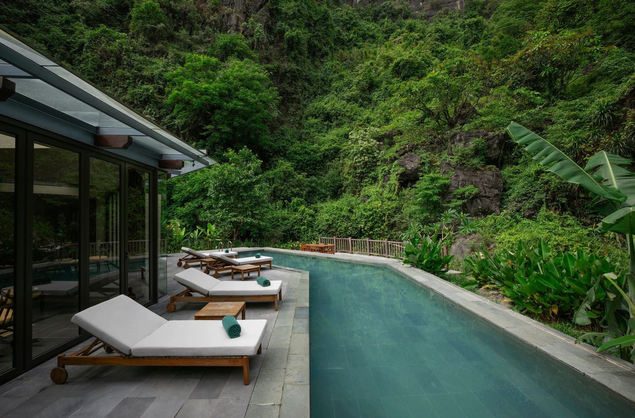 Waking up to the silent grandeur of the Hoa Lu mountains in a villa designed for total tranquility.