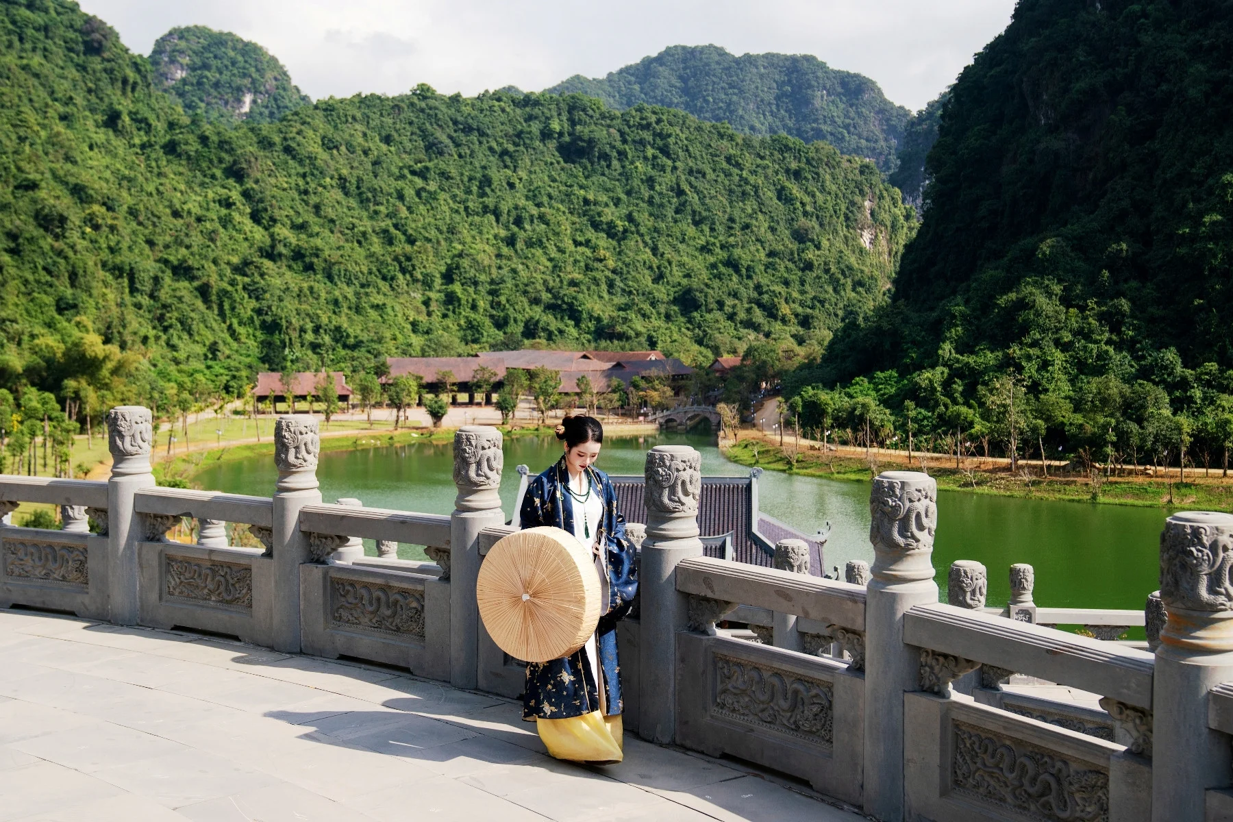 Ninh Binh Weather Guide: Seasons, Temperature & Rainfall Explained Capturing the moody beauty of a misty river journey, a highlight for couples visiting during the cooler months.