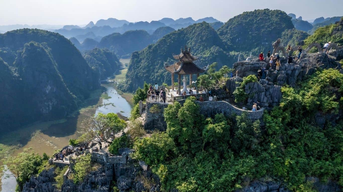 The dramatic limestone karsts providing a majestic backdrop to the region's top-rated nature retreats.