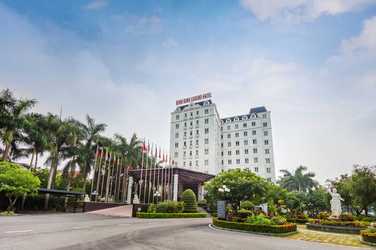 Admiring the classical French-inspired architecture of Ninh Binh Legend, a staple among Ninh Binh hotels.